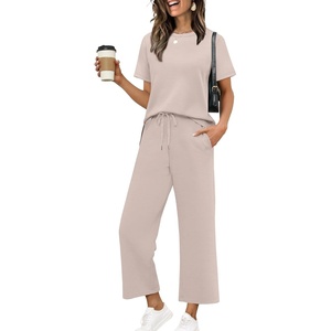 image:imageXIEERDUO Womens 2 Piece Outfits Summer Lounge Sets Side Slit Loungewear  Short Sleeve Top Matching Wide Leg Capri PantsApricot