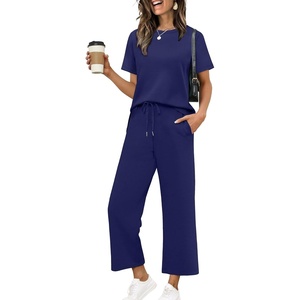 image:imageXIEERDUO Womens 2 Piece Outfits Summer Lounge Sets Side Slit Loungewear  Short Sleeve Top Matching Wide Leg Capri PantsNavy