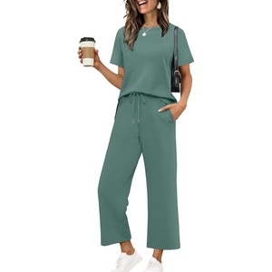 image:imageXIEERDUO Womens 2 Piece Outfits Summer Lounge Sets Side Slit Loungewear  Short Sleeve Top Matching Wide Leg Capri PantsDeep Green